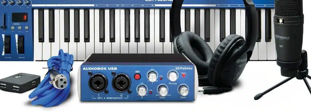 keyboard, headphones, mic, and more music studio equipment