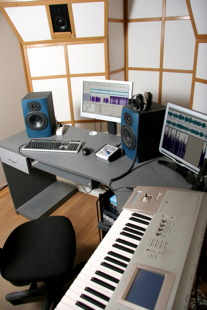 Recording Studio with keyboard, monitors, DAW, and more.